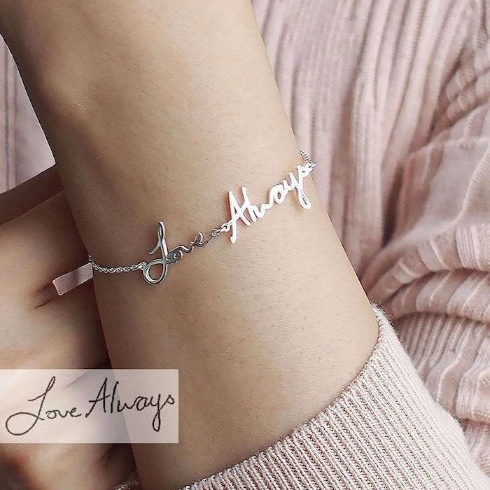 woman wearing a pink sweater, love always silver bracelet, christmas gifts for mom from daughter