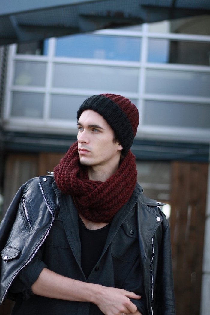 man wearing matching red and black beanie and scarf, black leather jacket, christmas gifts for boyfriend, black jacket and blouse