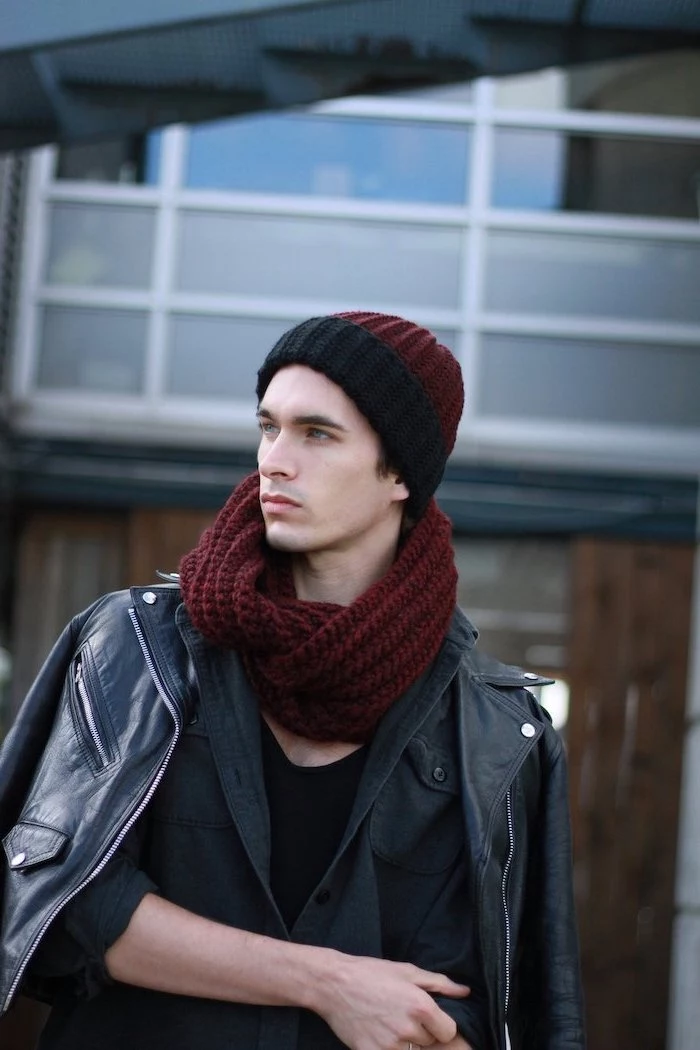 man wearing matching red and black beanie and scarf, black leather jacket, christmas gifts for boyfriend, black jacket and blouse