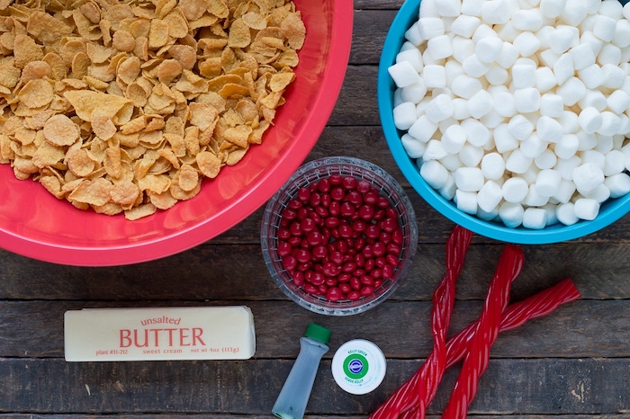 necessary ingredients in large bowls, placed on wooden surface, sugar cookie icing recipe, marshmallows in blue bowl