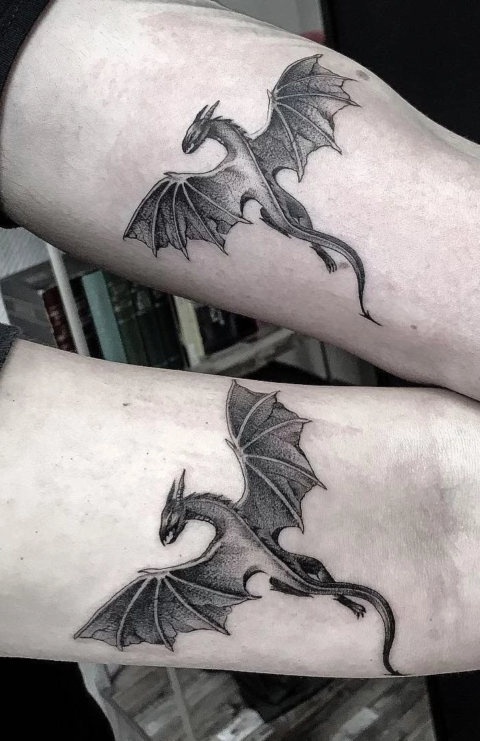 flying dragons, matching inside arm tattoos, dragon sleeve tattoo