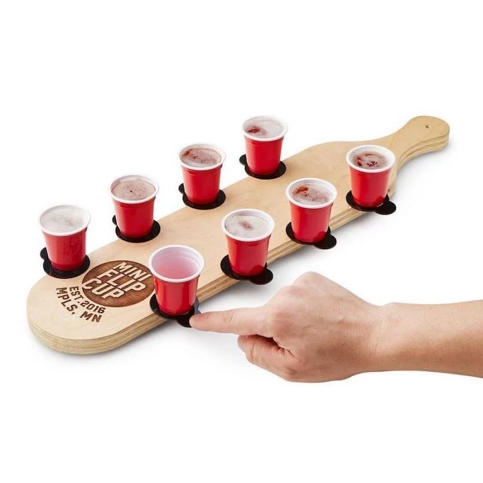 mini flip cup game, christmas presents for boyfriend, wooden board with four red cups on each side, filled with bear