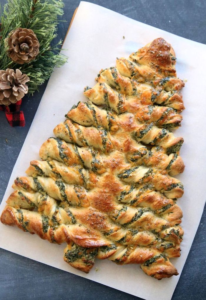 pull apart christmas tree, made of dough garlic and herbs, butter and cheese, make ahead christmas appetizers, placed on white board
