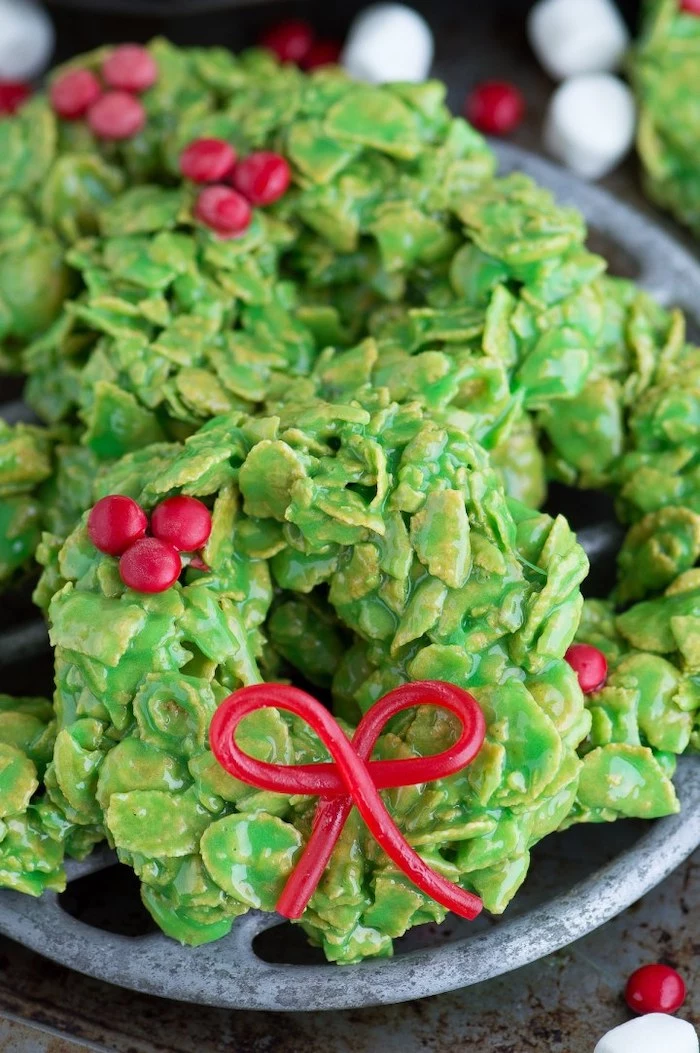 wreath shaped cookies, no bake cookies, sugar cookie icing recipe, placed in grey bowl on grey surface