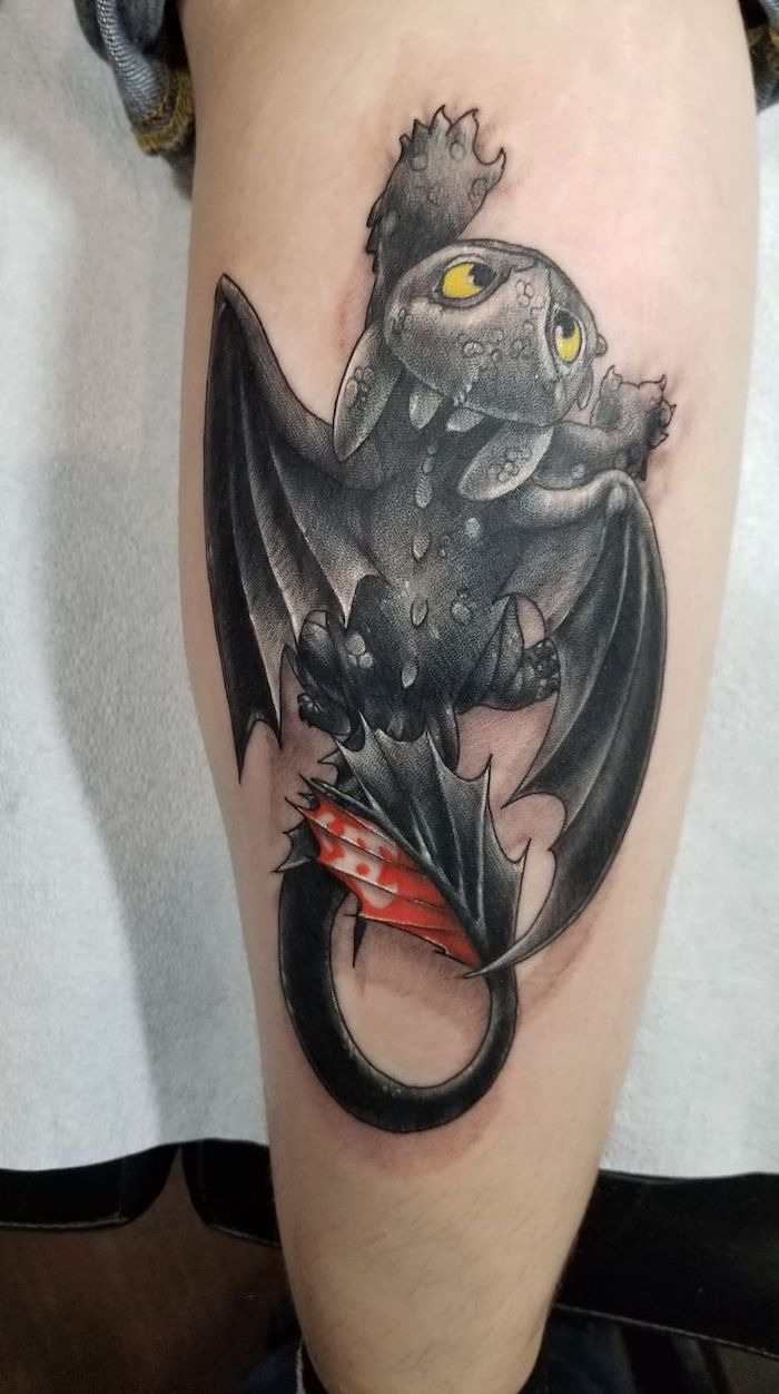 toothless climbing a wall, dragon tattoo meaning, black and red back of leg tattoo, white background