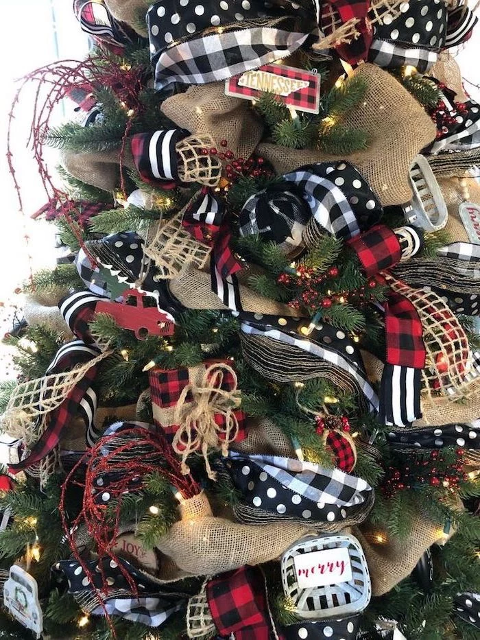 christmas decorations indoor ideas, faux tree decorated with black and white and gold ribbons, red presents ornaments