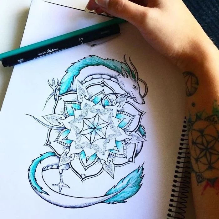 mandala dragon tattoo in blue and white, pencil sketch, dragon tattoo design, white background