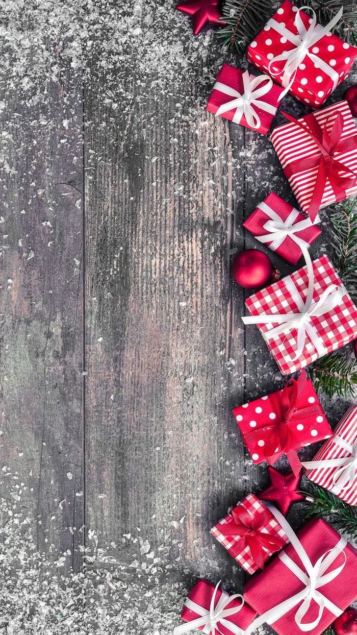 wrapped christmas presents, red baubles scattered on wooden surface, cool computer backgrounds, tree branches and snow