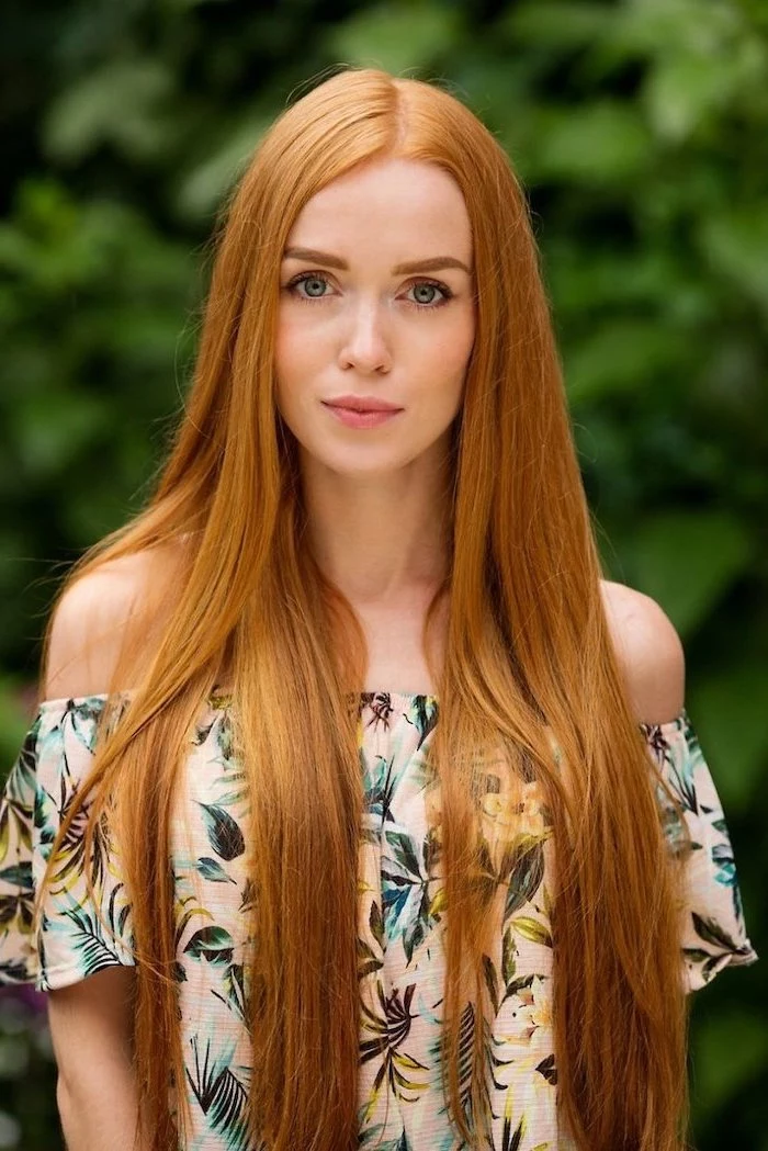 auburn natural long straight hair, 2020 hair color trends for brunettes, woman wearing a floral top with bare shoulders