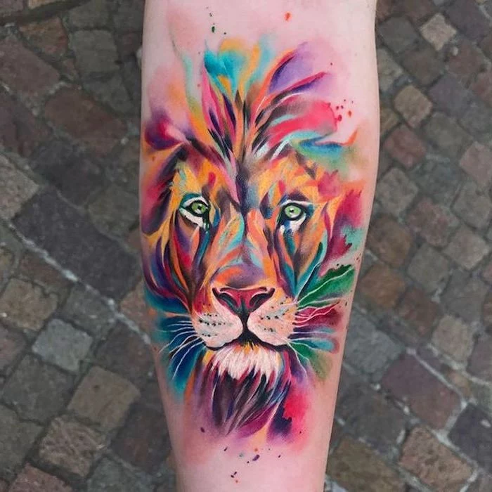 watercolor back of leg tattoo, lion tattoo, lion head with mane in different colors, paved street in the background