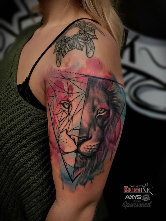 shoulder tattoo, lion hand tattoo, watercolor tattoo, geometrical design, lion head in different colors, on woman wearing green sweater
