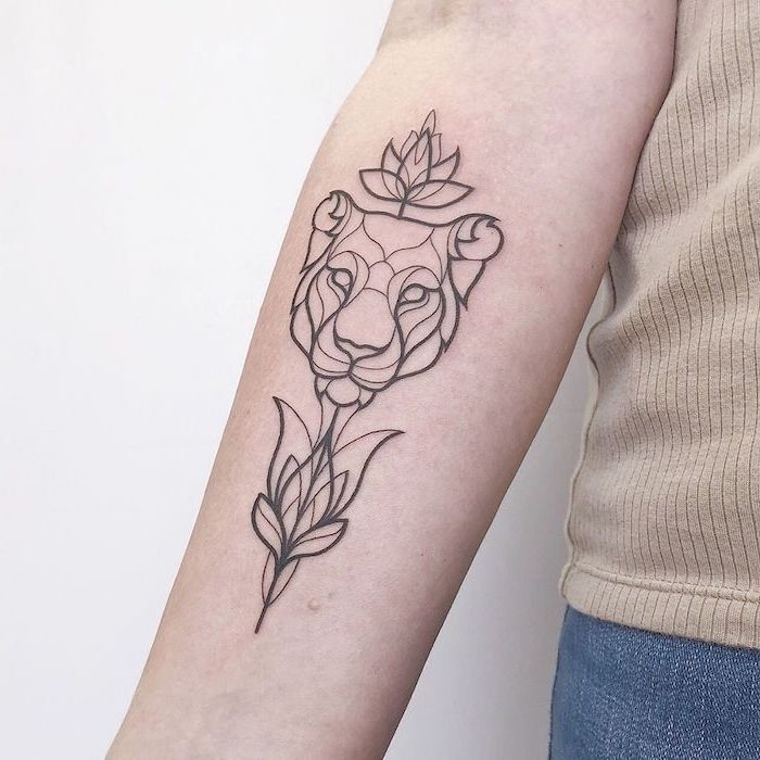 Lioness tattoo with flowers qustwant