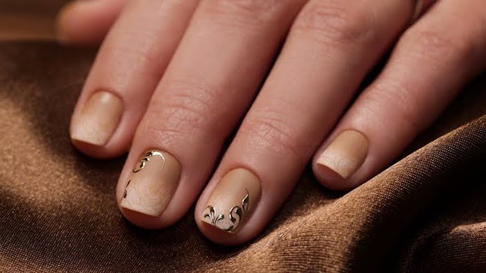 light to dark beige gradient matte nail polish, nude ombre nails, decorations on the middle and ring fingers