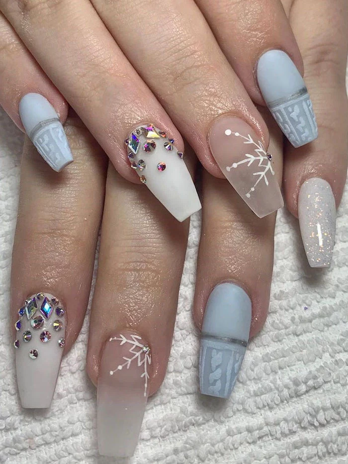 long coffin nails, cute nail colors, blue and white nail polish, different decorations with rhinestones on each nail