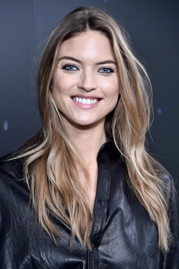 fall blonde hair, martha hunt victoria's secret angel, wearing black leather shirt, balayage brown hair with blonde highlights