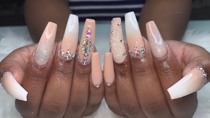 nude to white gradient nail polish, glitter and rhinestones decorations on each finger, red ombre nails, long coffin nails