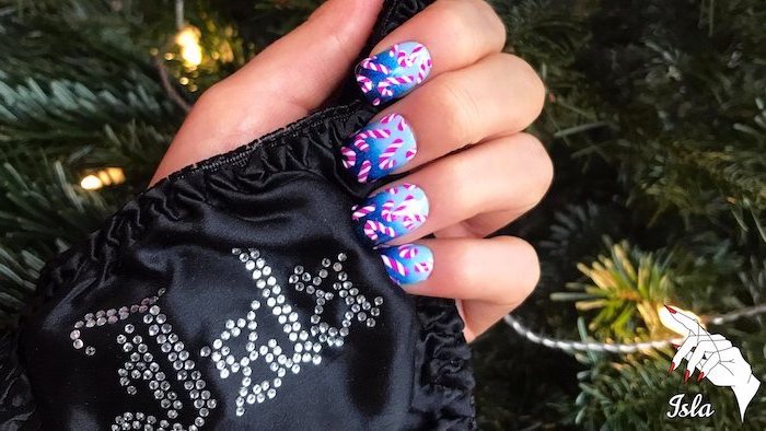 blue ombre nail polish, candy cane decorations on each nail, popular nail colors, medium length square nails