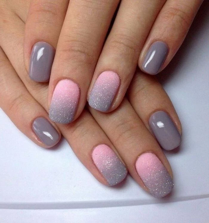 pink to grey glitter matte gradient nail polish, on the middle and ring fingers, french tip acrylic nails, grey nail polish on the rest of the fingers