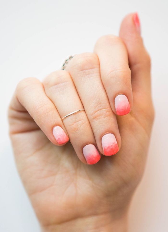 light to dark pink gradient nail polish, french fade nails, short squoval nails, white background