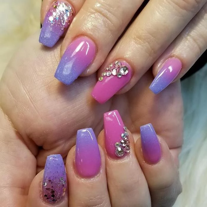 pink to purple gradient nail polish, rhinestones decorations on the ring fingers, french fade nails, glitter on the index fingers