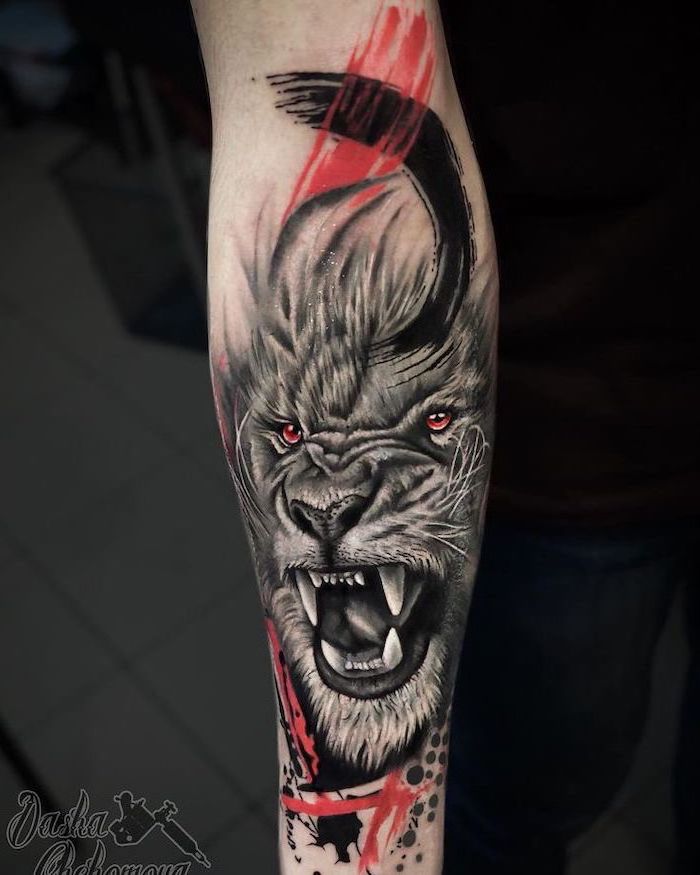 lion tattoo on arm