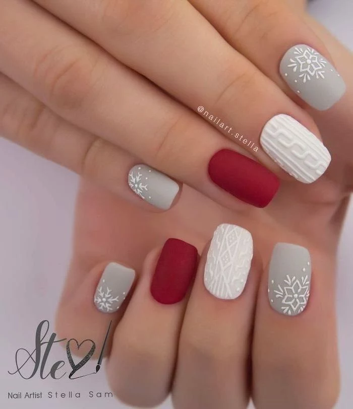 christmas nail colors, grey white and red matte nail polish, decorations on the middle index and pinky fingers