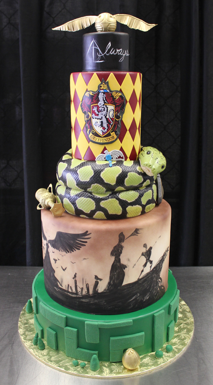 five tier cake, harry potter cake, nagini tier below the gryffindor tier, deathly hallows inspired tier with the story of three brothers illustrations