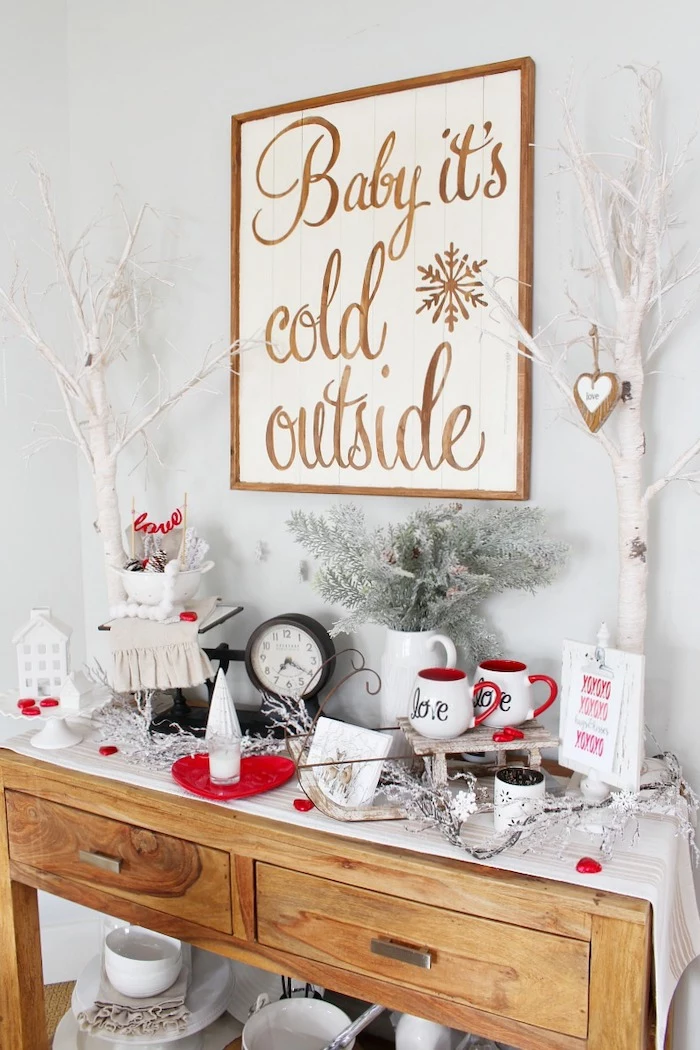 baby it's cold outside wooden sign, valentine decorations, wooden shelf with different decorations on it, love coffee mugs