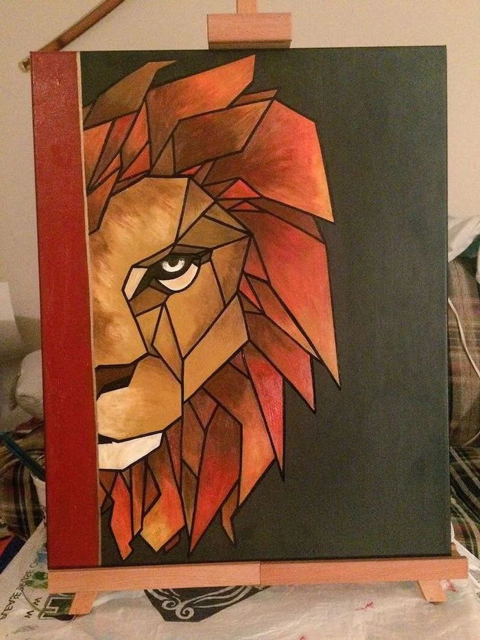 geometrical painting of a lion head, easy canvas painting ideas, painted on black background, step by step acrylic painting tutorial