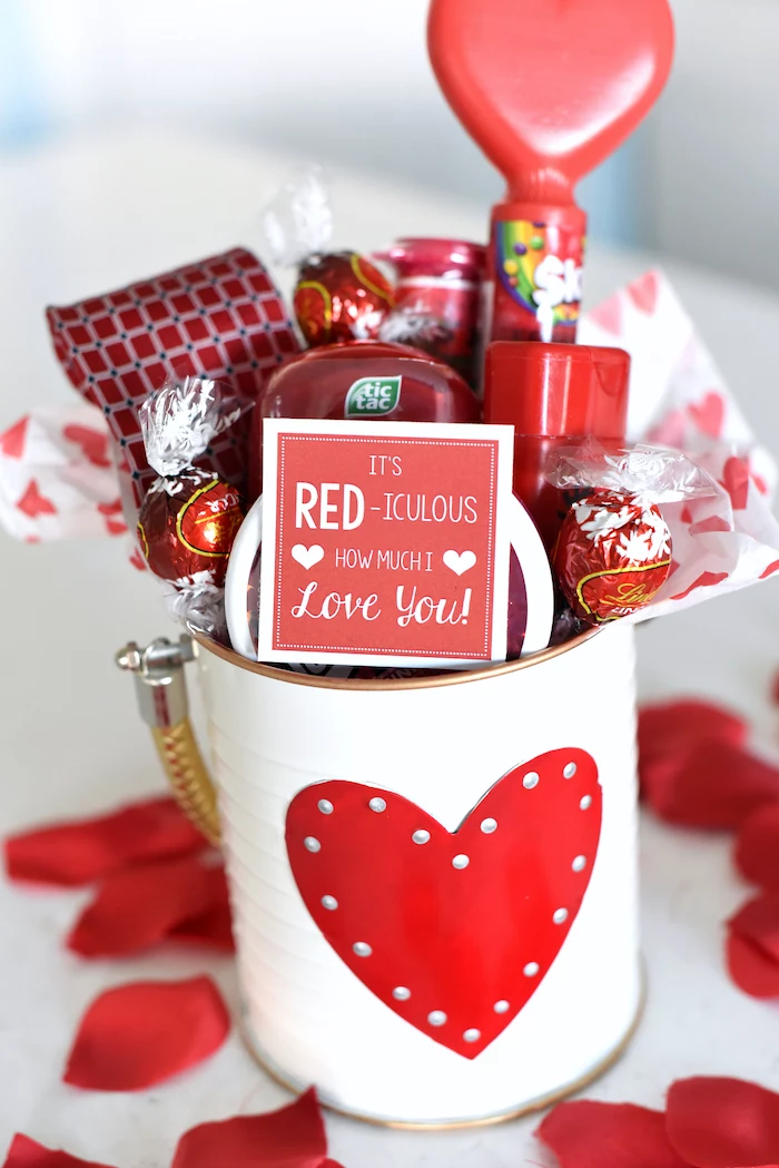 white metal tin can with heart at the front, filled with different candy, romantic gifts for her, lindor chocolates and skittles