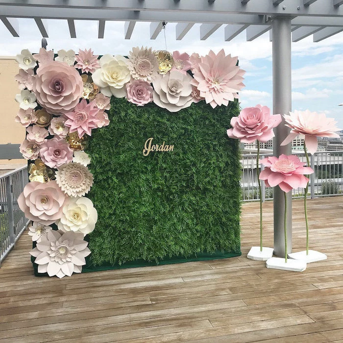 greenery backdrop with large paper flowers, giant paper flowers, different shapes and sizes, paper flowers stands