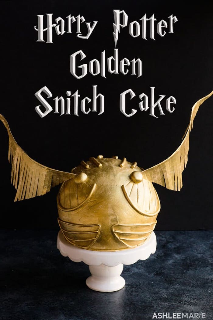 harry potter golden snitch cake, step by step diy tutorial, harry potter cake, cake placed on white cake stand