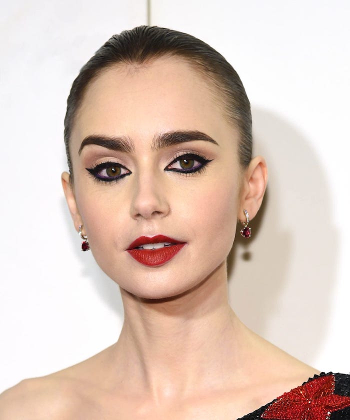 lily colins, photographed on the red carpet, how to do eyeshadow, nude eyeshadow colors, black cat eyeliner, dark red matte lipstick