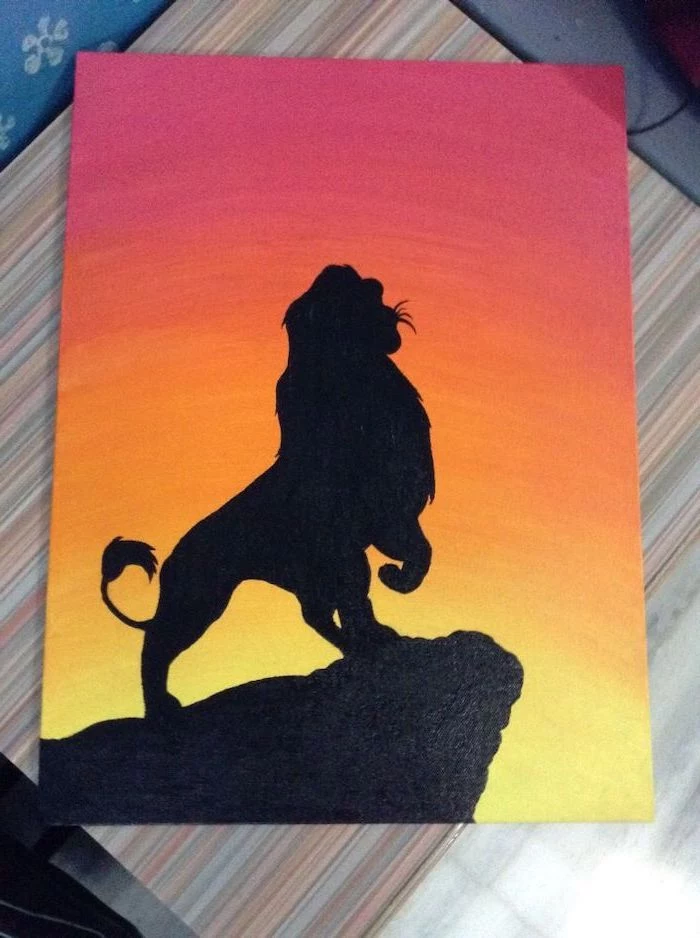 what should i paint, lion king silhouette, standing on the rock, sunset sky in red orange and yellow