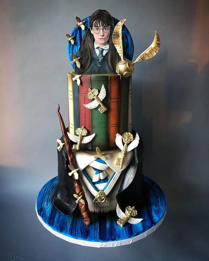 moaning myrtle topper, ravenclaw three tier cake, 11th birthday cake, ravenclaw uniform, golden snitch and keys
