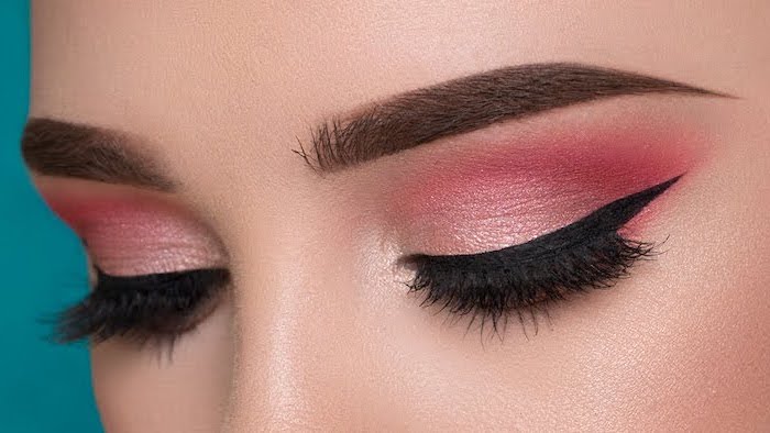 red and pink eyeshadow colors, black cat eyeliner, how to do makeup, woman with dark thick eyebrows