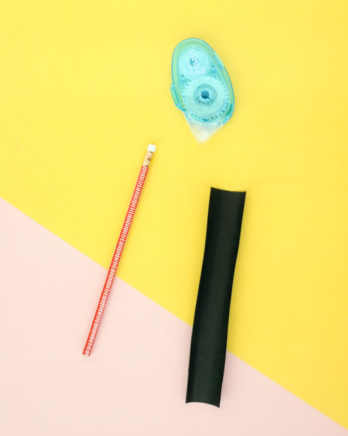 pencil and black tape, valentines day gifts for her, placed on a blush and yellow surface, step by step diy tutorial