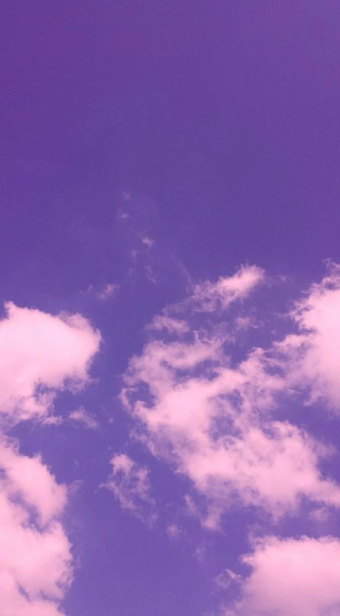 photograph of a sky, pink aesthetic background, purple sky with white clouds