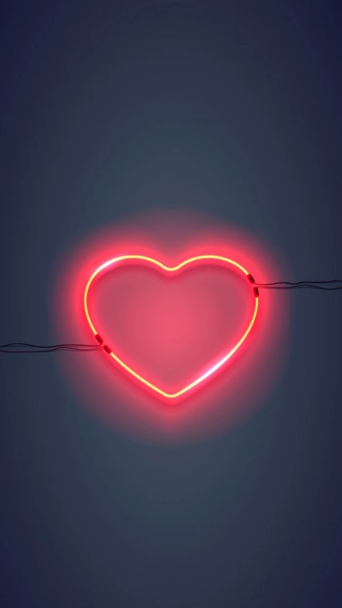 red heart shaped neon light, hanged on grey wall, pink aesthetic background, dark grey background