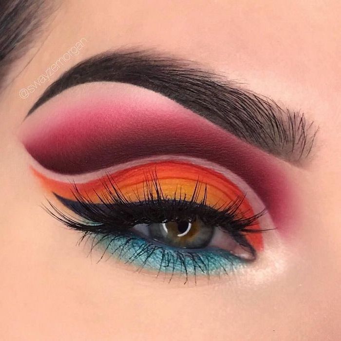 red orange and turquoise eyeshadow colors, black cat eyeliner, makeup for beginners, woman with green eyes and thick eyebrows
