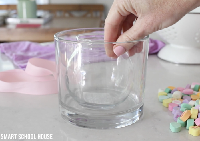 small glass vase inside a large one, step by step diy tutorial, valentines day gifts for her, conversation hearts on the side
