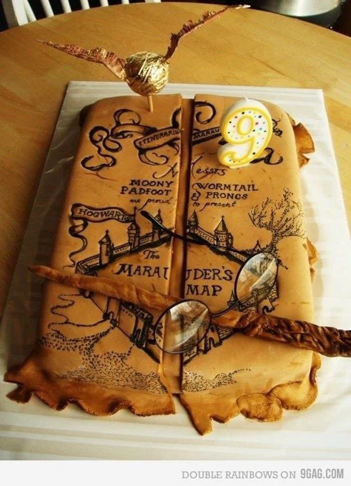 one tier cake, marauder's map, harry potter birthday cake ideas, wand and glasses, golden snitch on top