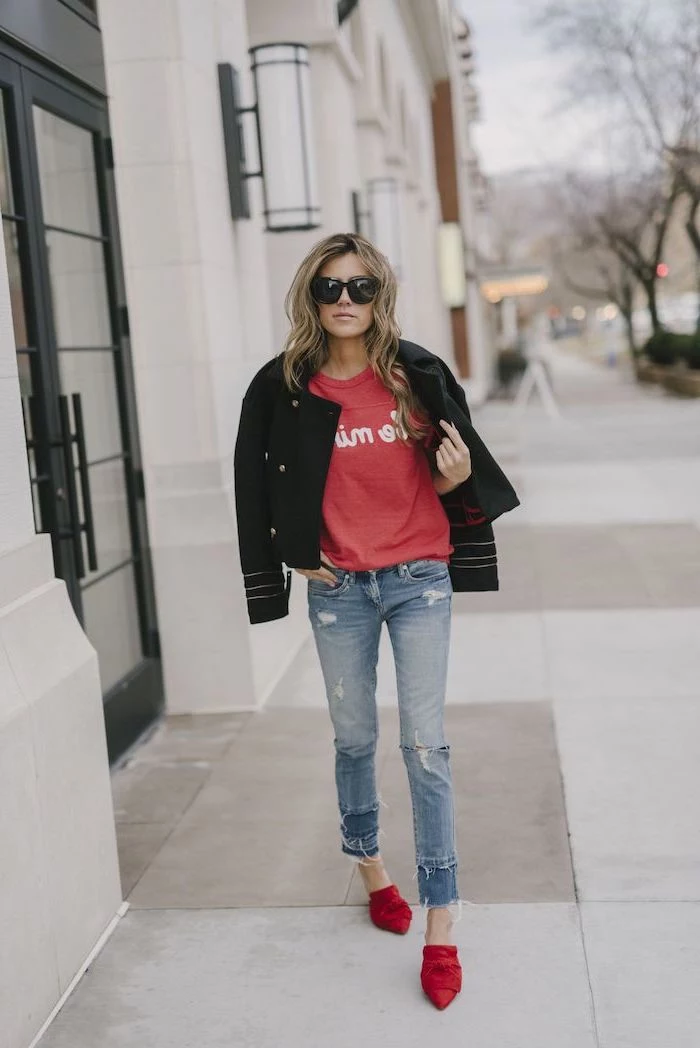 woman wearing jeans and pink blouse, black leather jacket, cute valentines day outfits, red velvet shoes