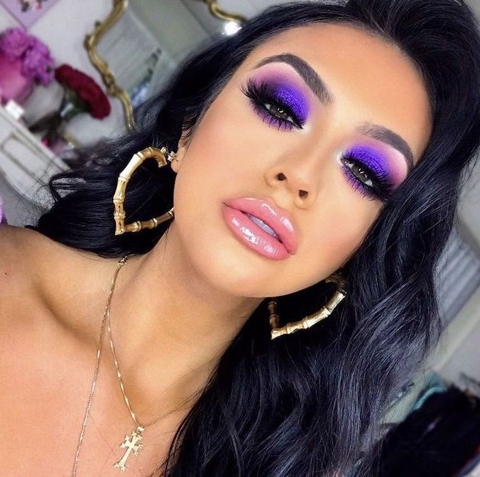 colorful eyeshadow, purple and pink eyeshadow colors, long black lashes, nude lip gloss, woman with long black wavy hair