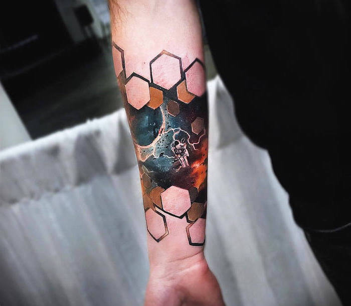 colored forearm tattoo, space tattoo sleeve, honeycomb geometrical tattoo, astronaut in space