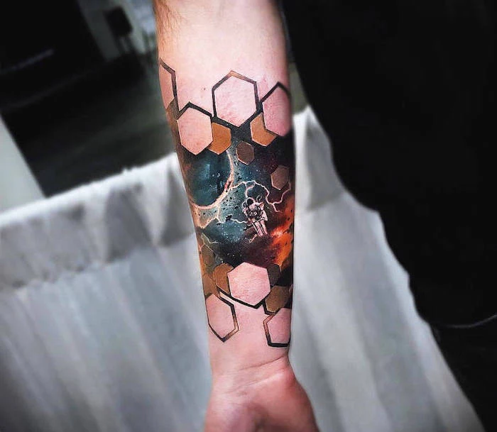 colored forearm tattoo, space tattoo sleeve, honeycomb geometrical tattoo, astronaut in space