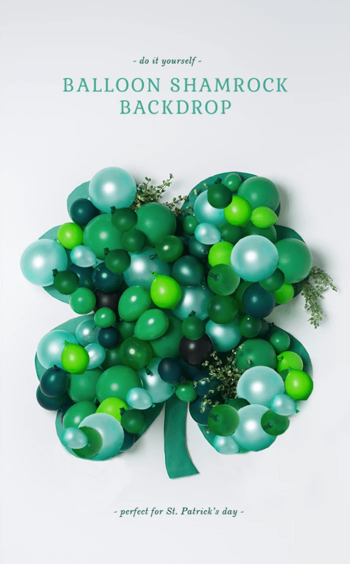step by step diy tutorial, balloon shamrock backdrop, hanging on white wall, happy st patrick's day