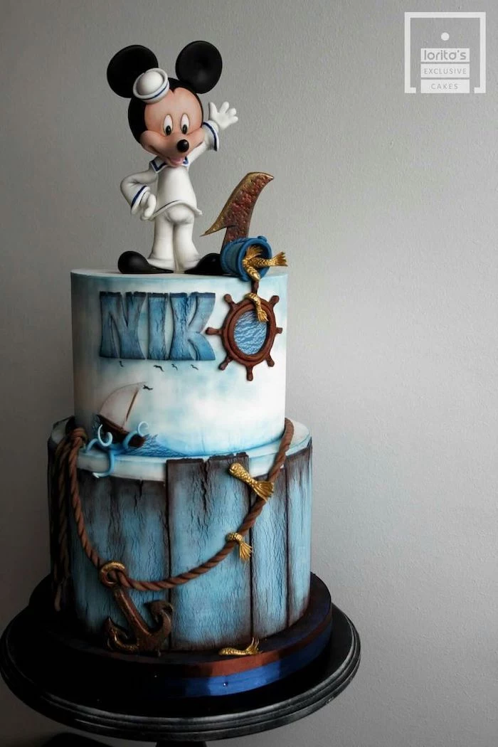 two tier cake, mickey mouse birthday cake, nautical themed cake, covered with blue fondant, sailor mickey cake topper