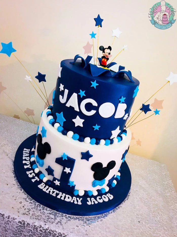 two tier cake, covered with blue and white fondant, celebration cakes, decorated with blue and white stars
