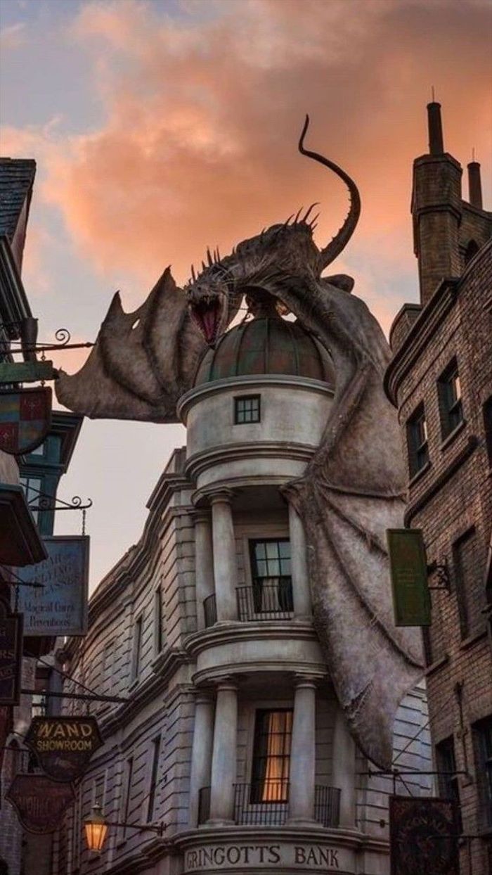 dragon standing on top of gringotts bank, wallpaper harry potter, still from the movie